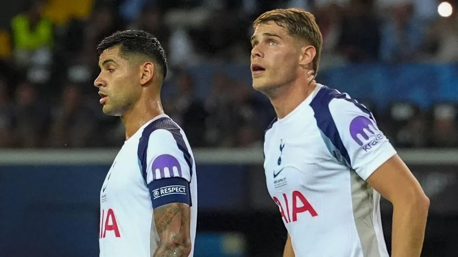 Two Tottenham players observing during a match
