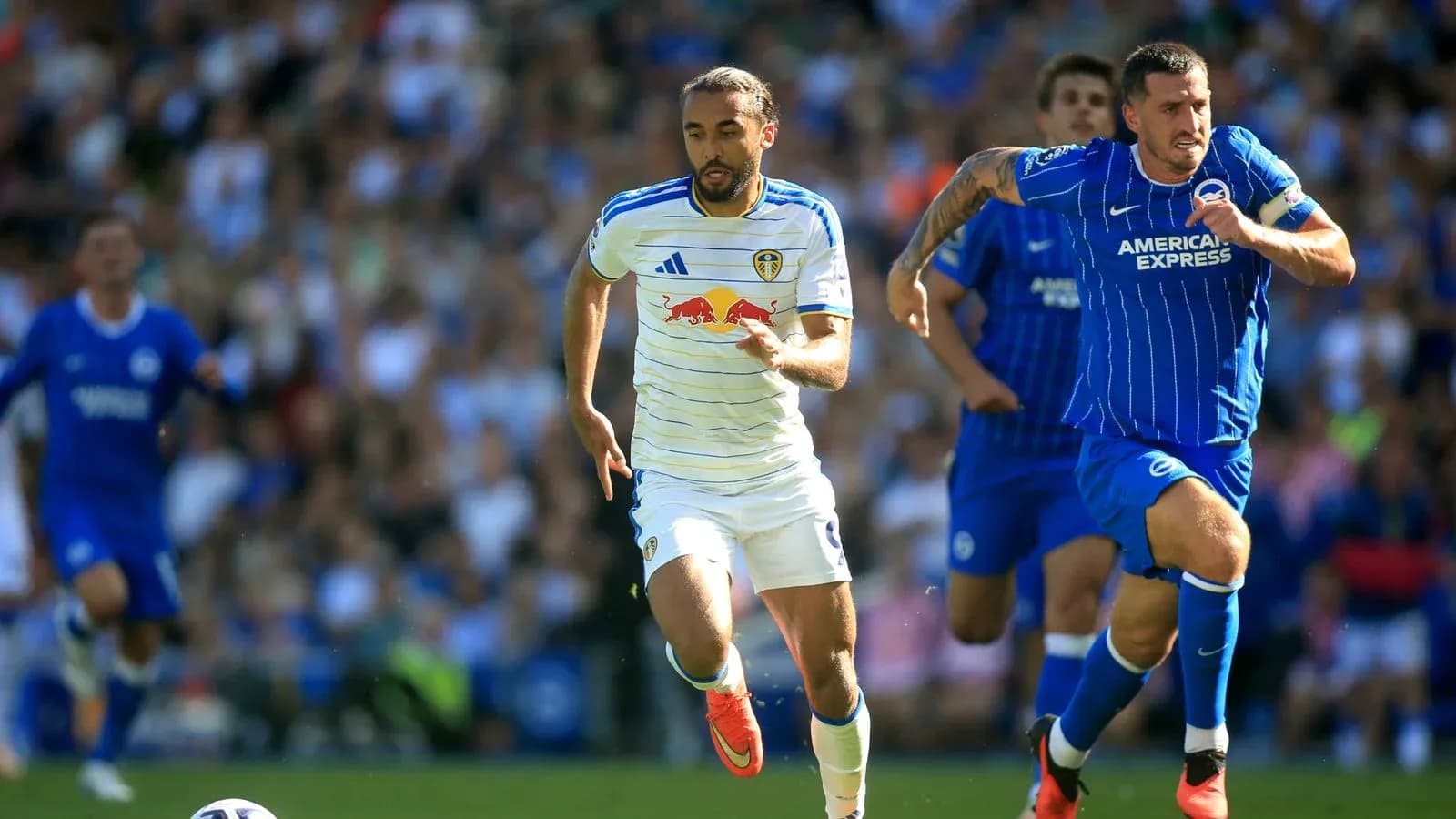 Leeds player sprinting with Brighton player chasing