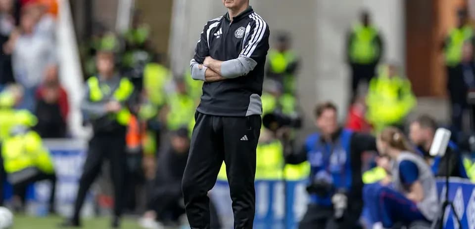 Coach observing the match from the sidelines