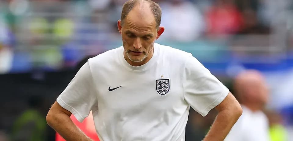 Coach walking on the field after match
