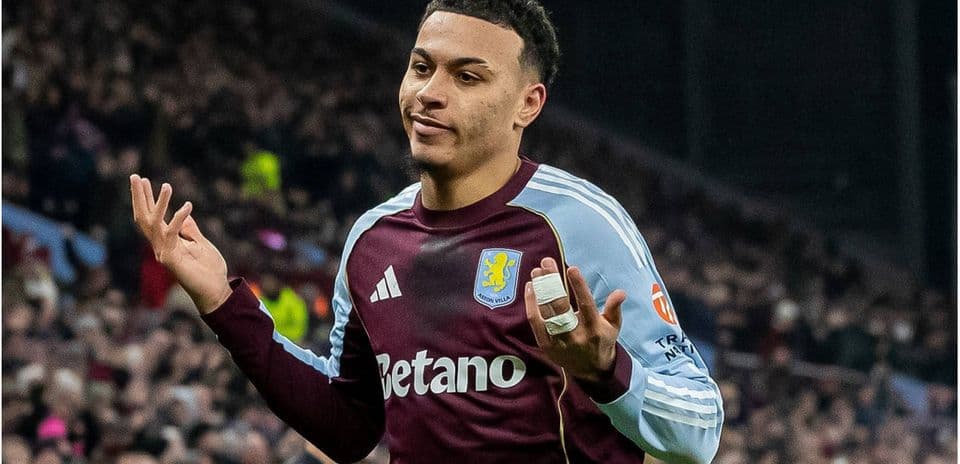 Aston Villa player gesturing during match