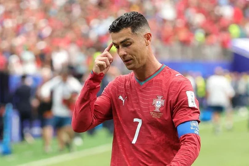 Cristiano Ronaldo gesturing on the pitch during match