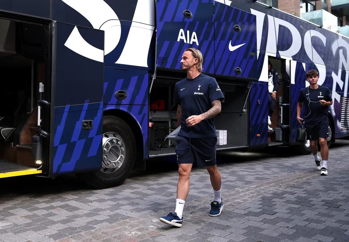 Tottenham players arriving at team bus before match