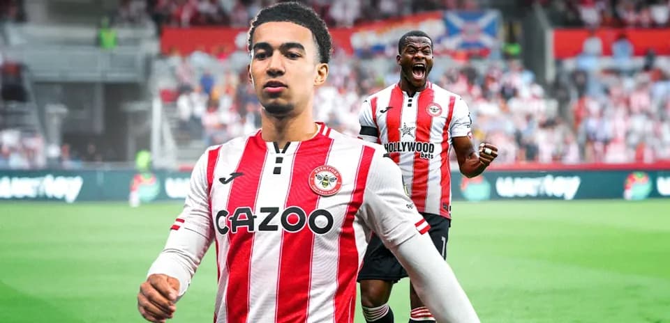 Brentford players on pitch during match celebration