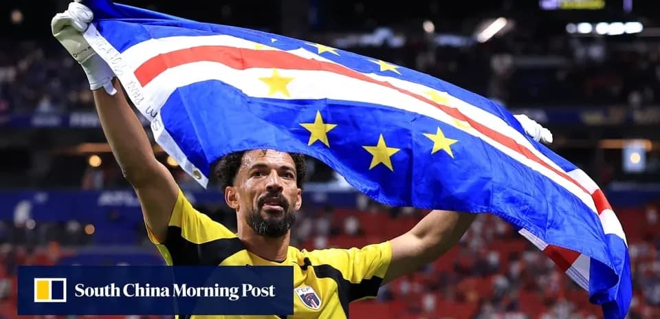 Goalkeeper celebrating with Cape Verde flag