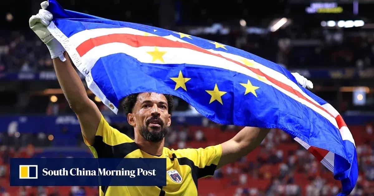 Goalkeeper celebrating with Cape Verde flag