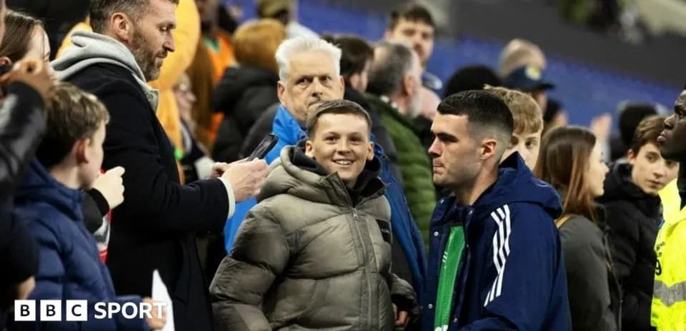 Fans interacting during a football match event