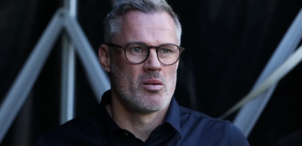 Person with glasses in a dark shirt