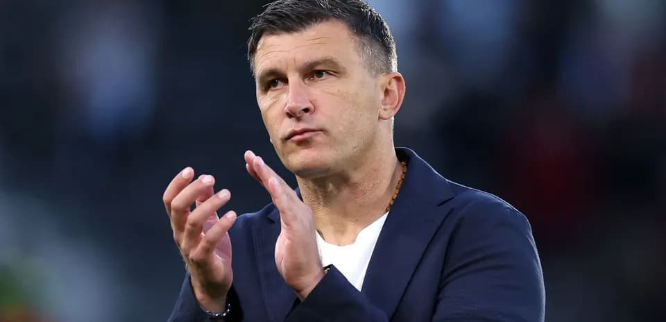 Coach gesturing during a match or event