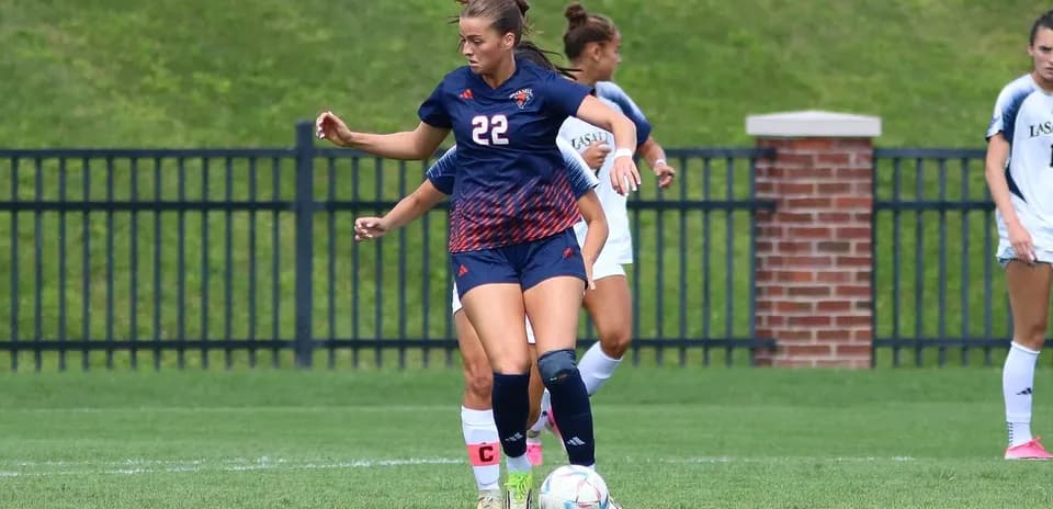 Player dribbling the ball during a soccer match