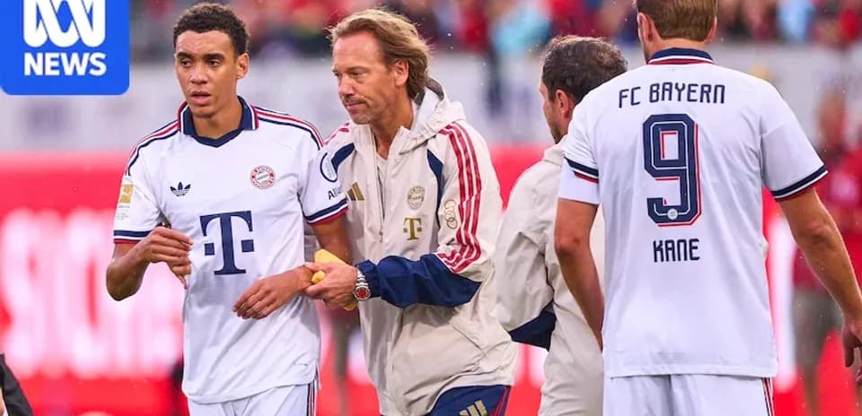 Bayern Munich players and coach on the sidelines