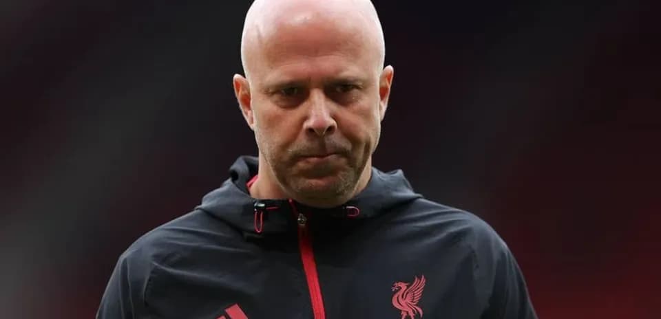 Liverpool coach on the pitch before match