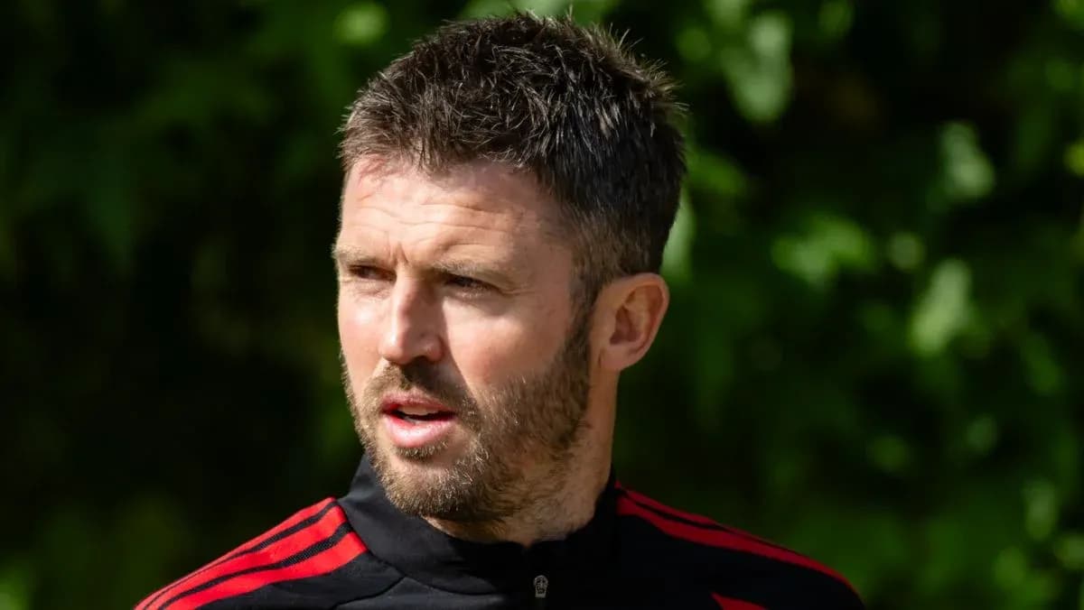 Football coach during training session outdoors