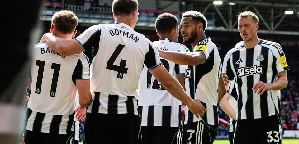 Newcastle players celebrating during a match