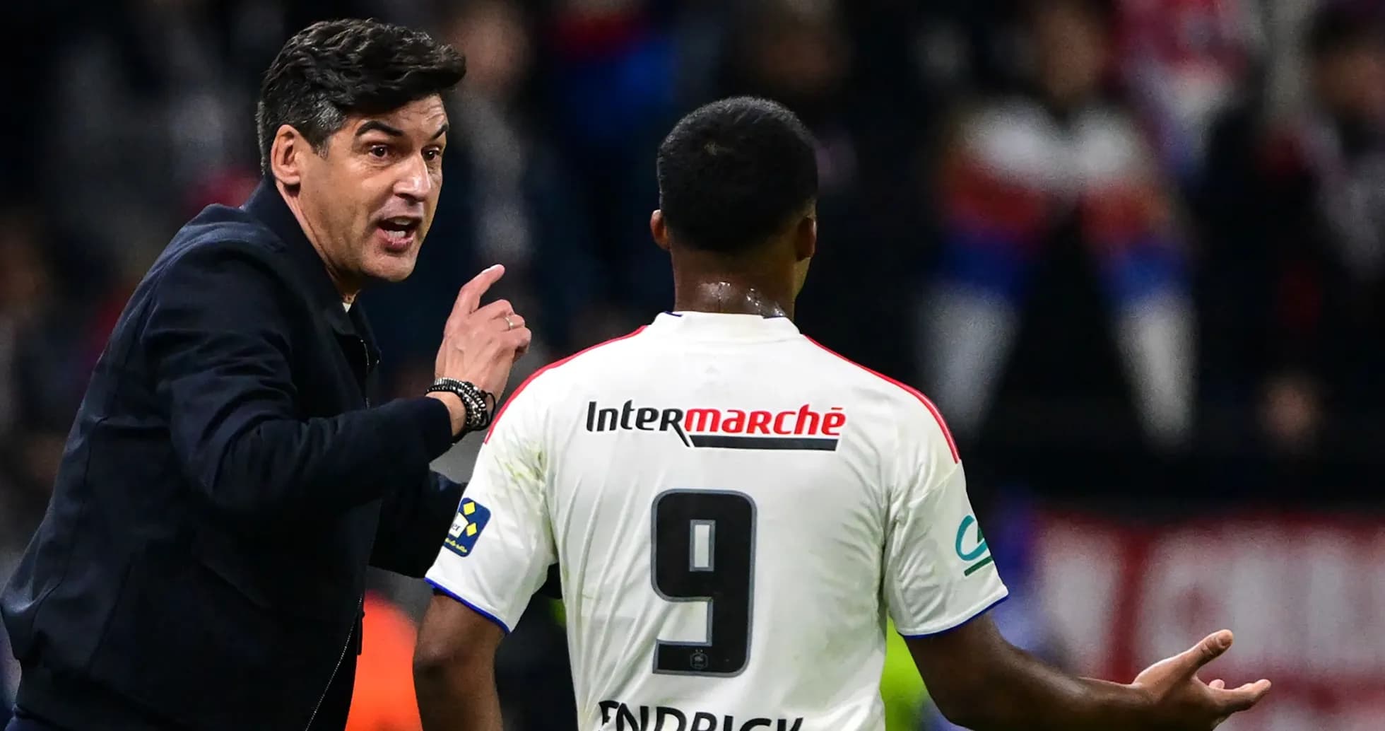 Coach giving instructions to player during match