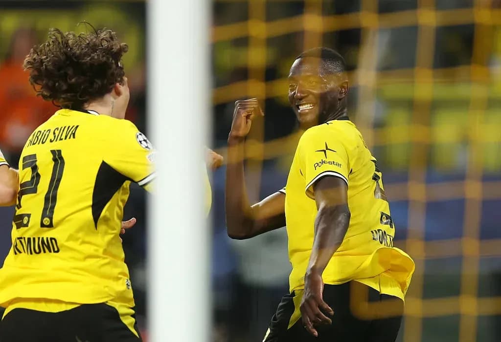 Dortmund players celebrating a goal during match