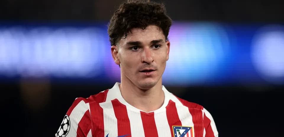 Atletico Madrid player in red and white jersey