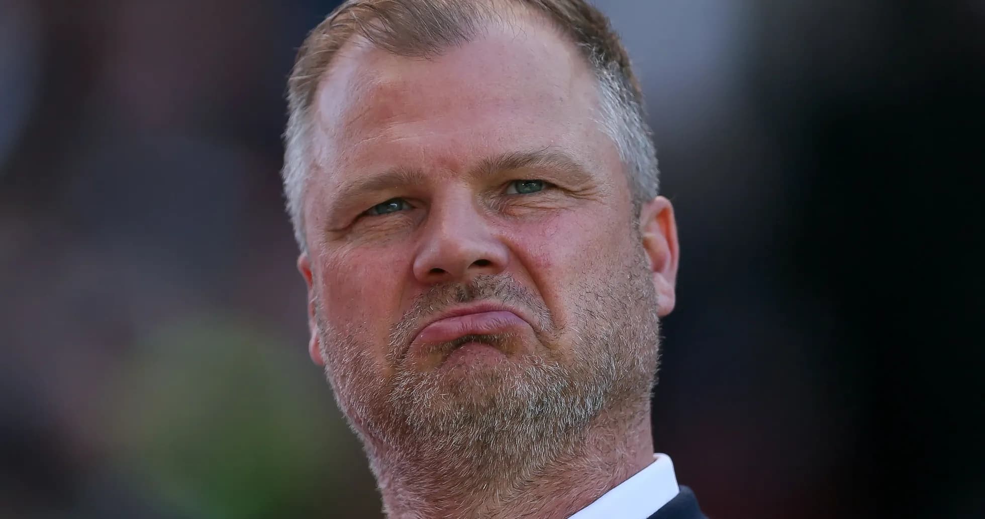 An individual looking serious during a match