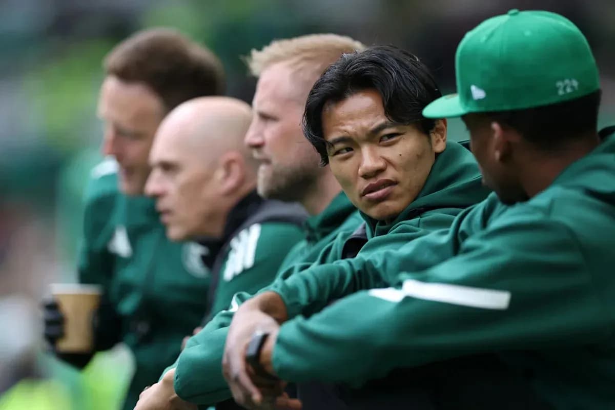 Players sitting on the bench during a match