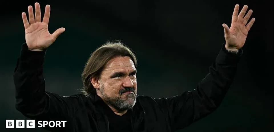 Coach gesturing with hands during match