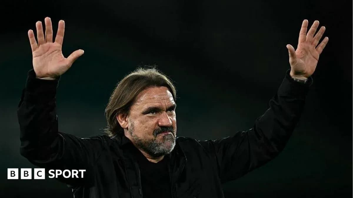 Coach gesturing with hands during match