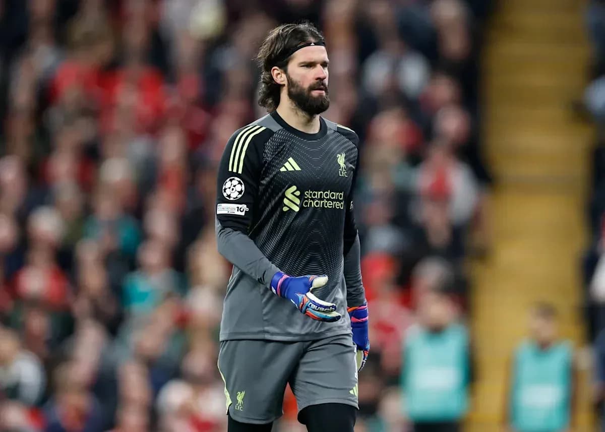 Goalkeeper Alisson Becker walking on the pitch