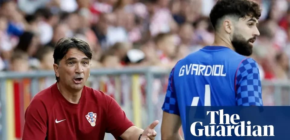 Croatian coach giving instructions to player during match