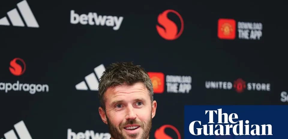 Men's football manager speaking at press conference