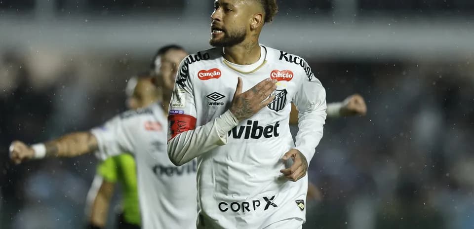 Neymar celebrating after scoring a goal for Santos