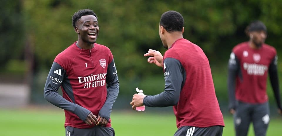 Arsenal players laughing during training session