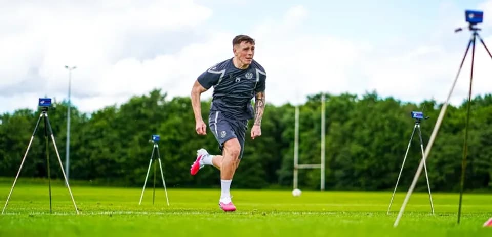 Player sprinting during training session on pitch