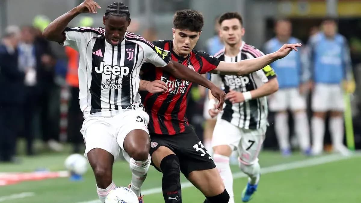 Juventus and AC Milan players competing for the ball