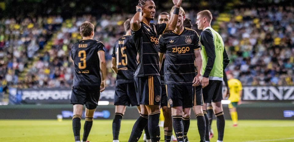 Ajax players celebrating a goal during match