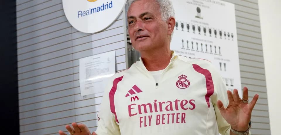 Real Madrid coach speaking at training facility