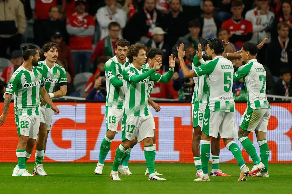 Real Betis players celebrating a goal on pitch