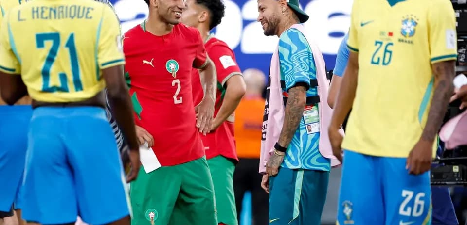 Players interacting on the field after match