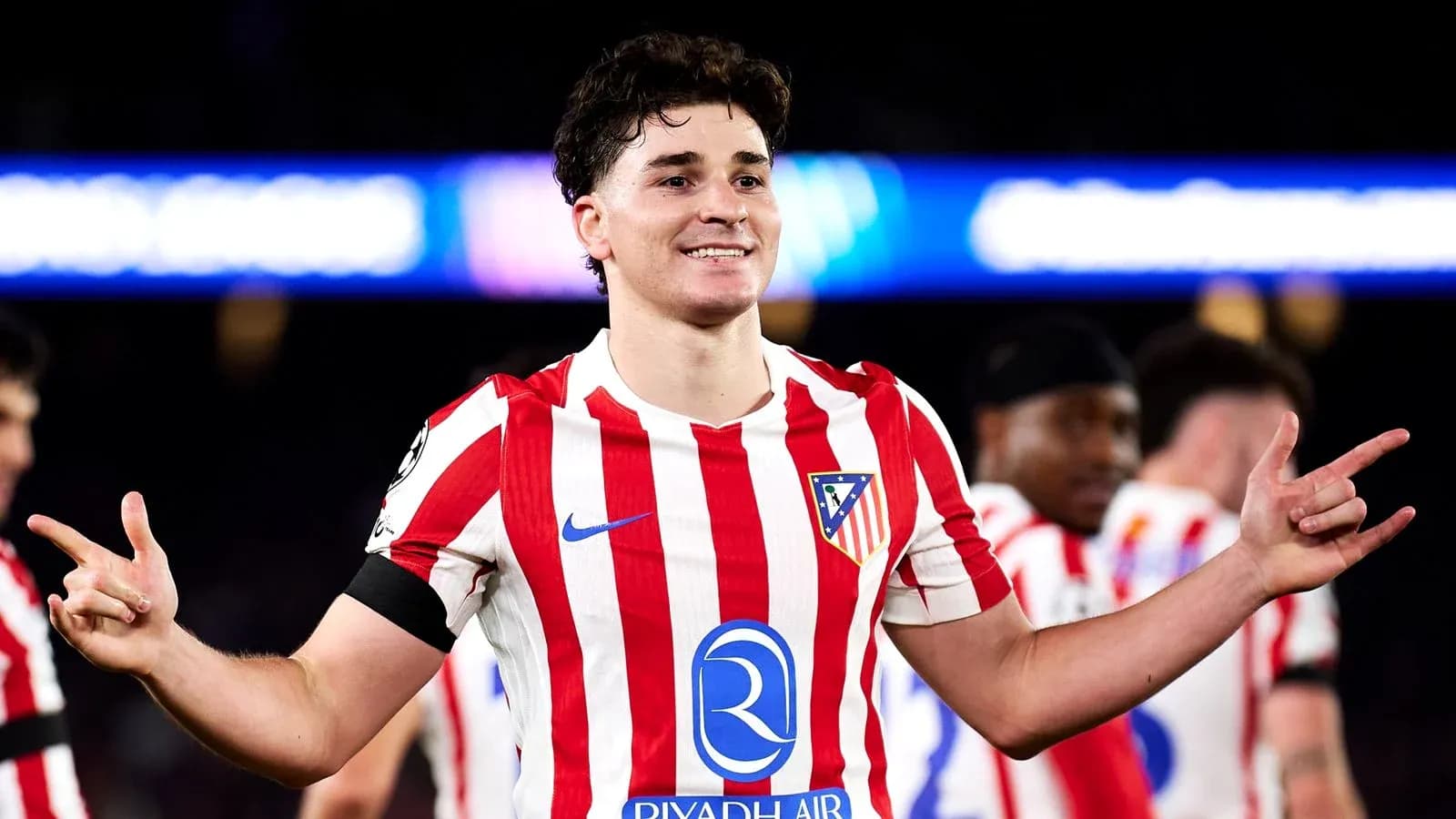 Atletico Madrid player celebrating after match
