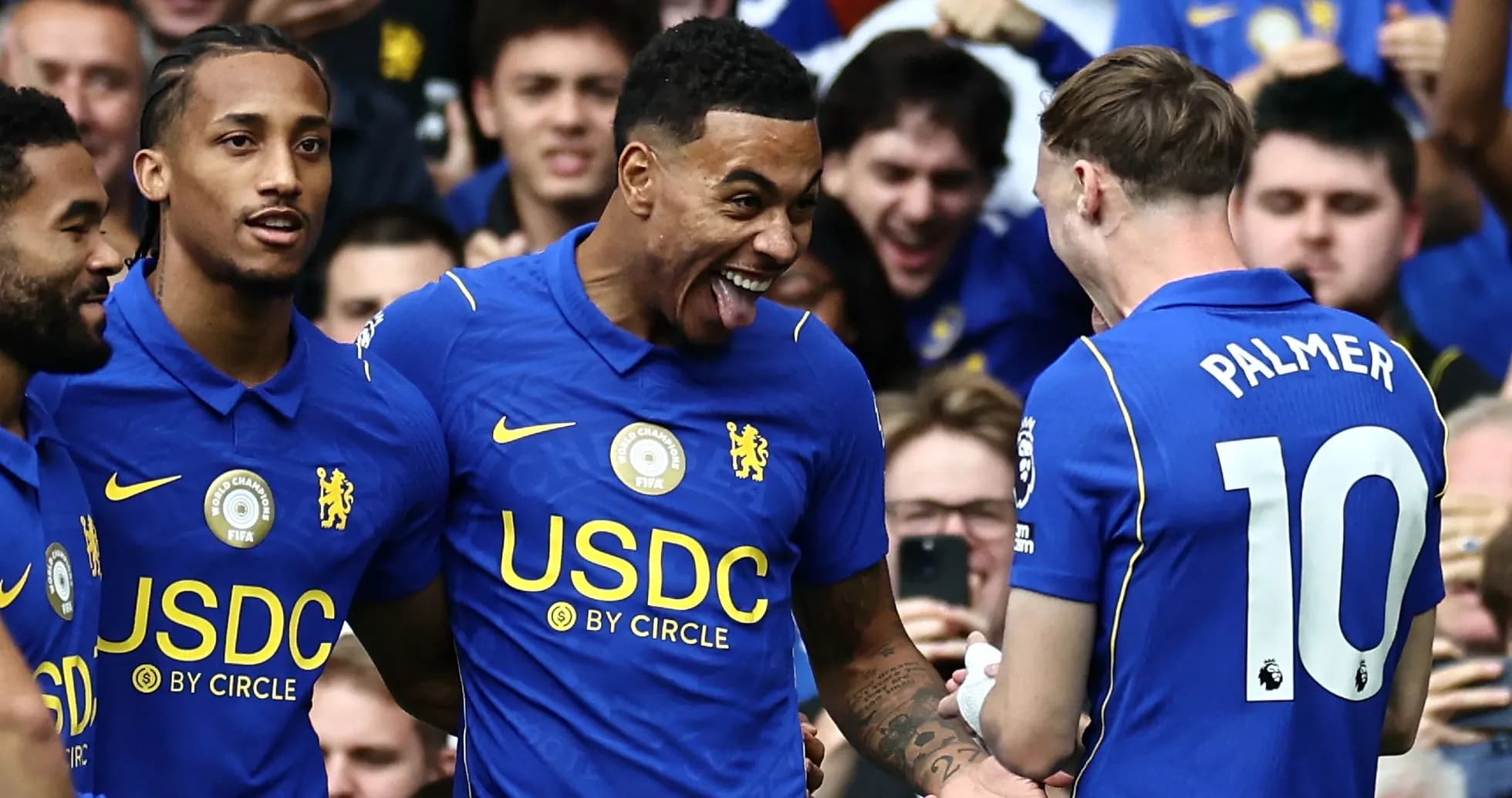 Chelsea players celebrating a goal during match