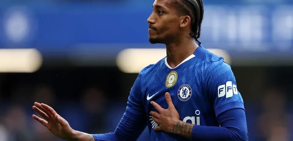 Chelsea player gesturing during match at Stamford Bridge