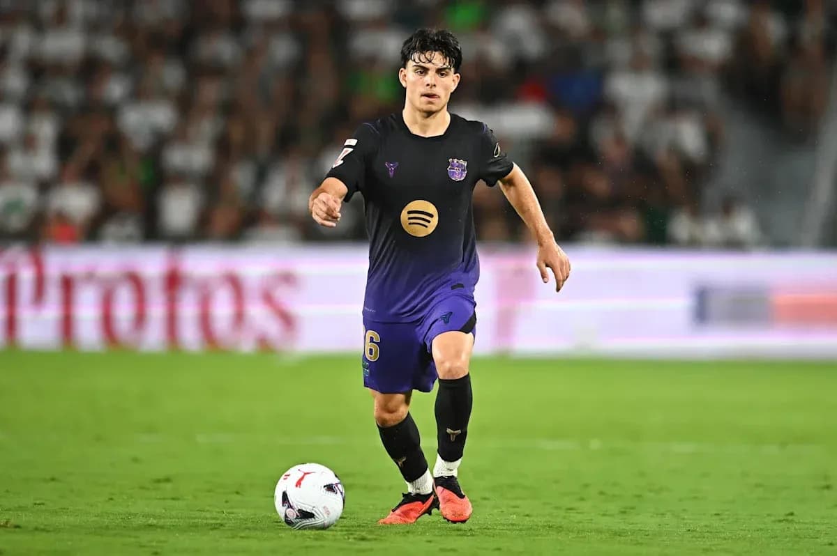 Player dribbling ball during a football match