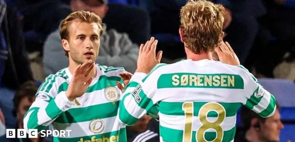 Celtic players exchanging gestures during a match