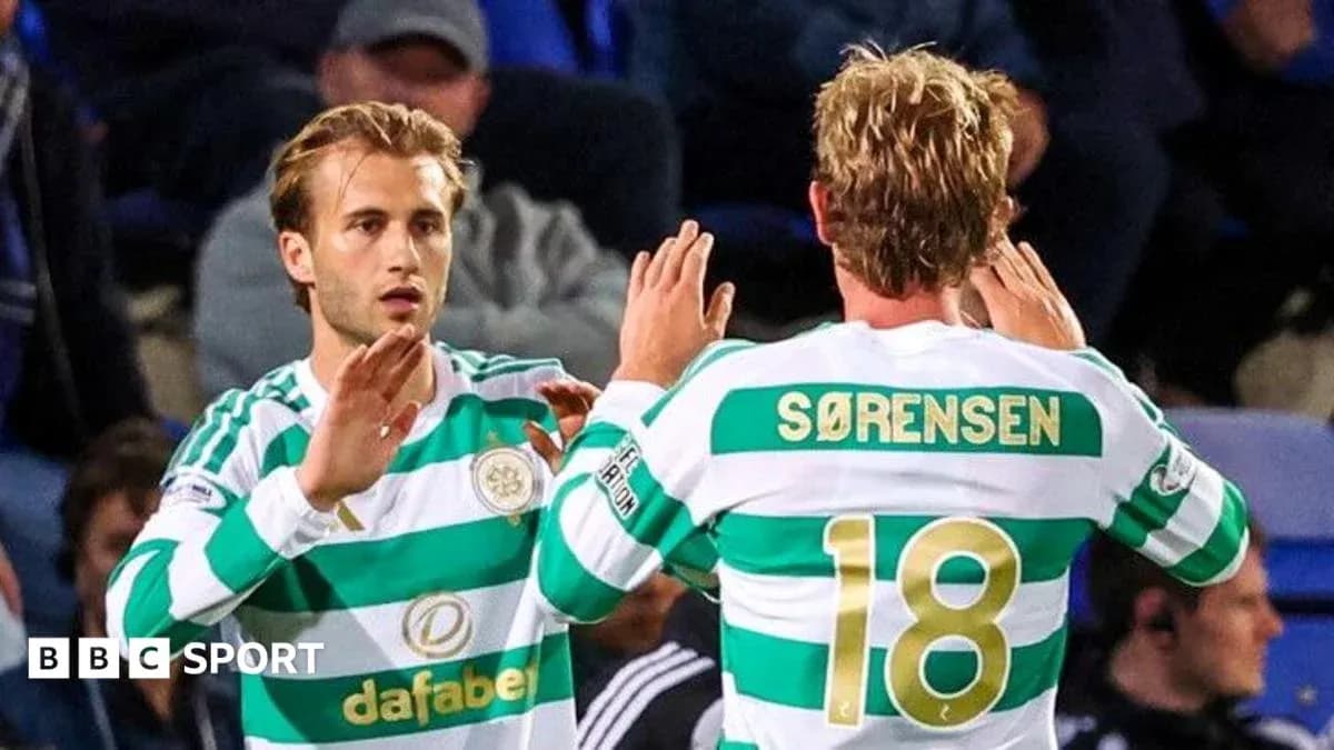 Celtic players exchanging gestures during a match