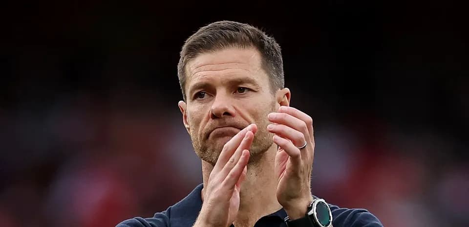 Coach applauding during match at the stadium