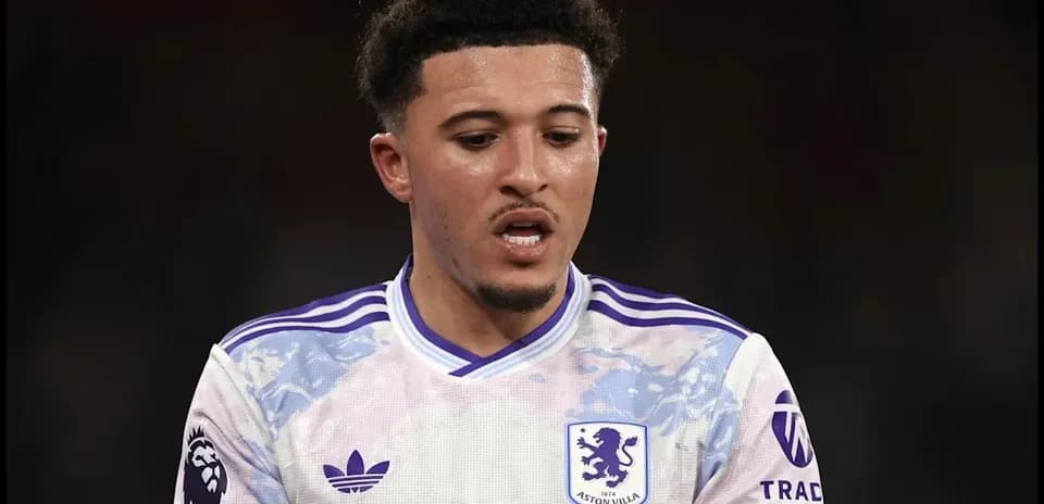 Aston Villa player during a match, focused expression