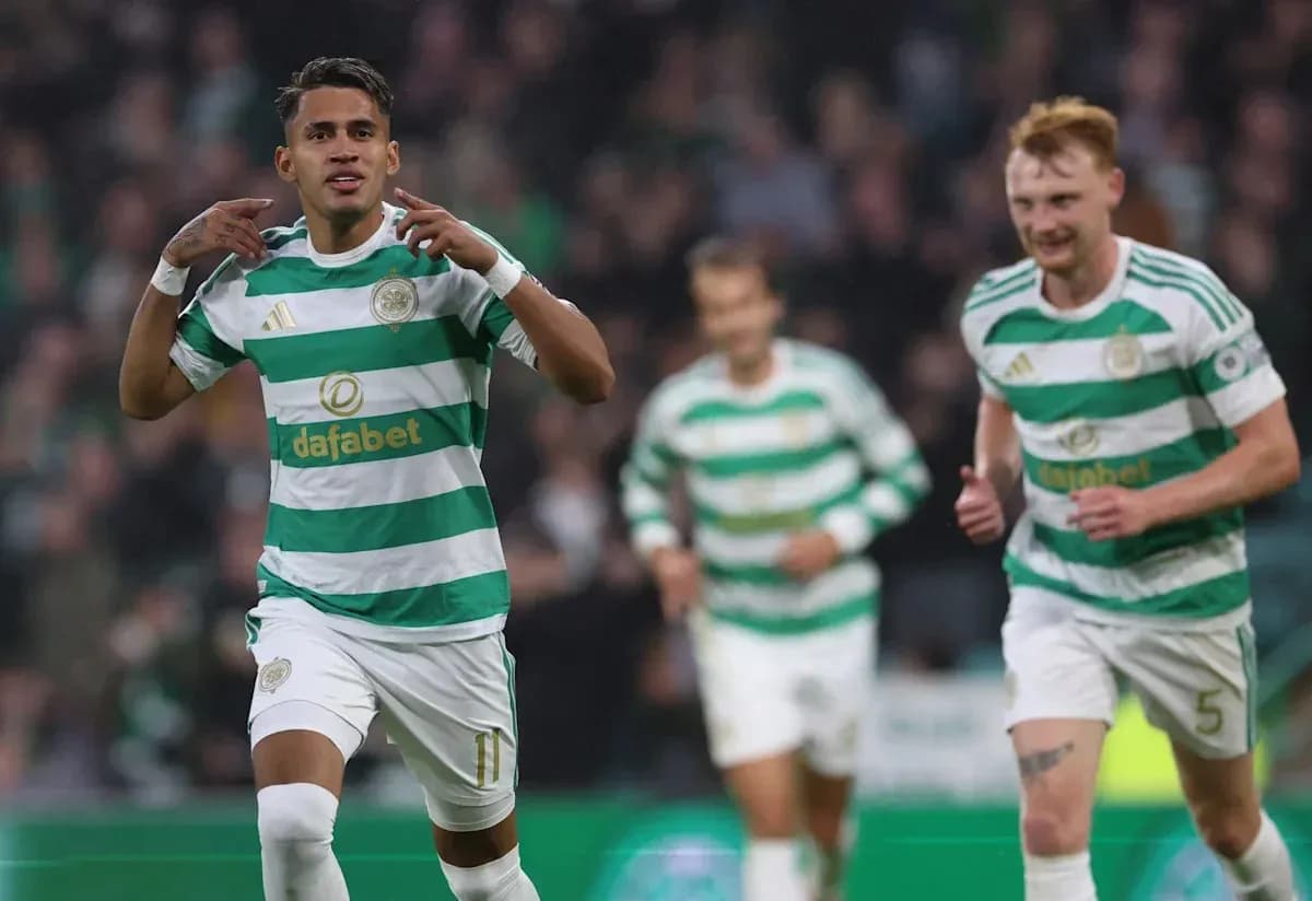 Celtic players celebrating a goal during a match