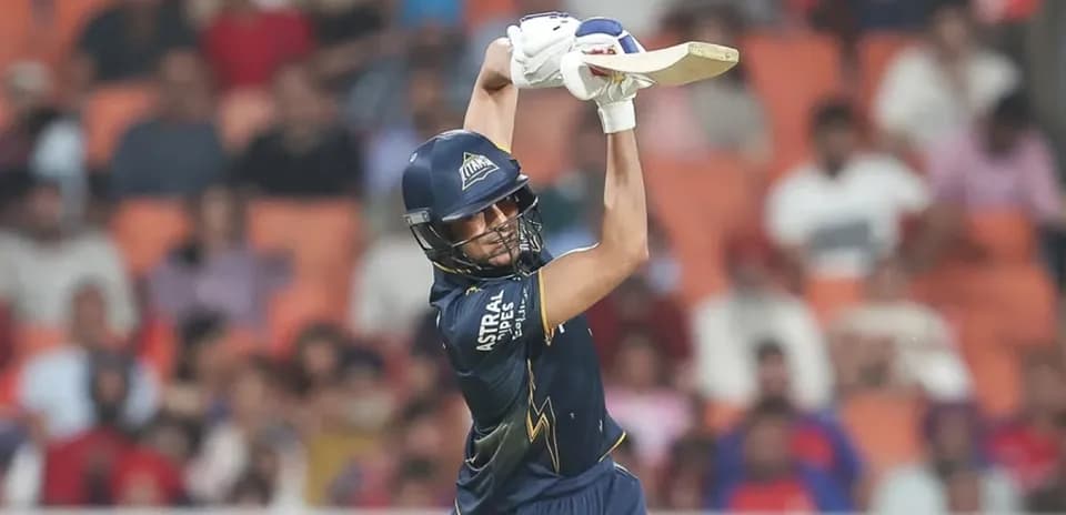 Batsman hitting ball during cricket match