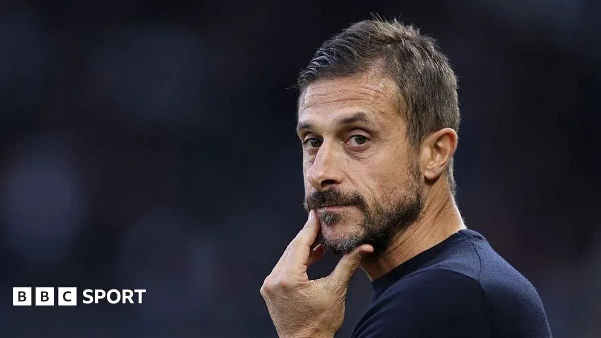 Coach looking thoughtfully during a match