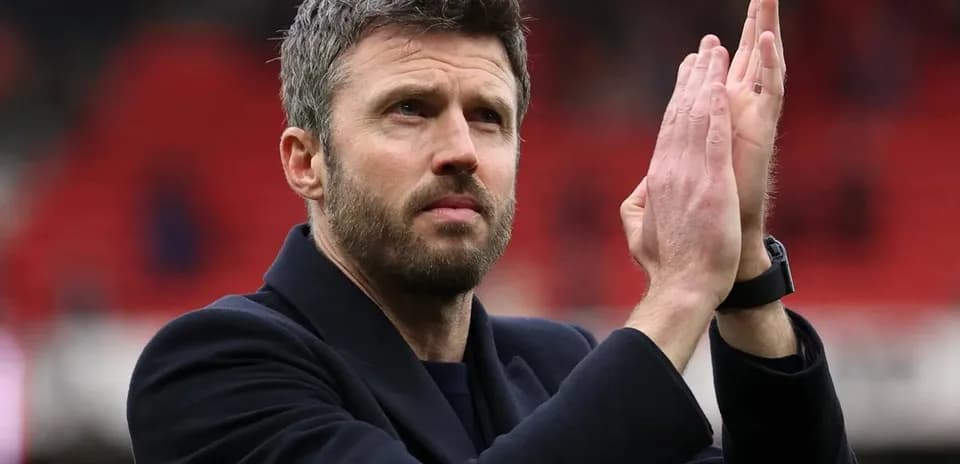 Coach applauding fans after the match