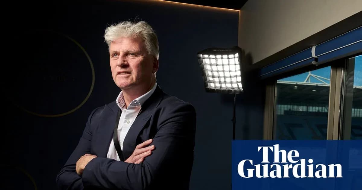 Man posing in front of bright studio lighting