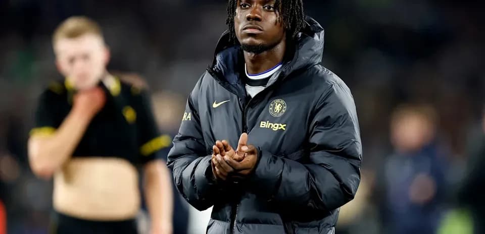 Chelsea player applauding after the match